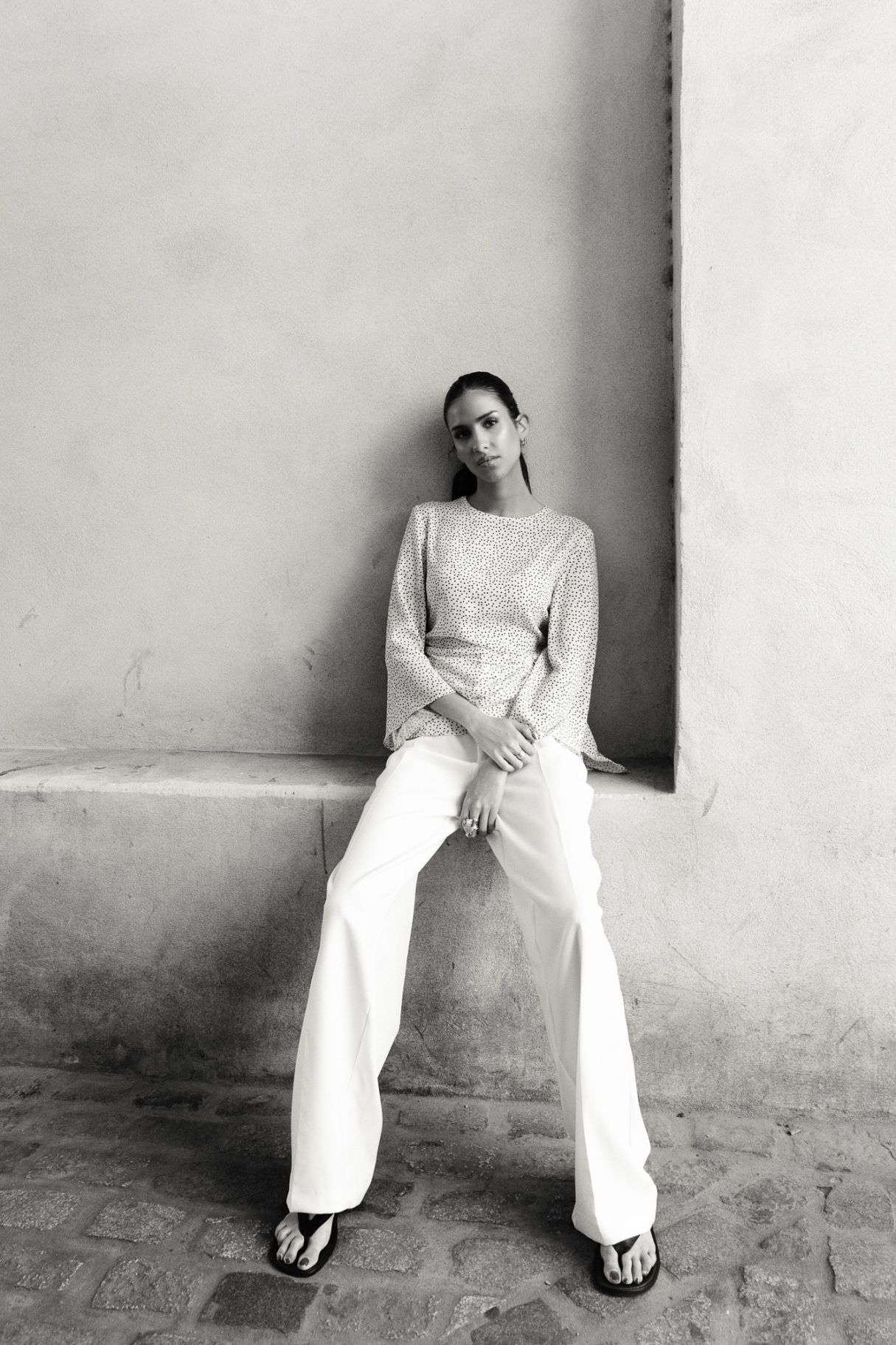 BLUSA CON DETTAGLI DORATI